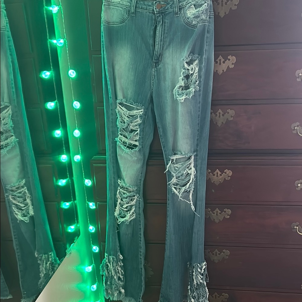 Fashion Nova Blue Straight Leg Jeans with Distressed Style